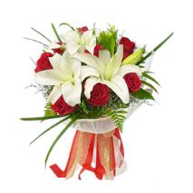Send 2 lilies and Vibrant 9 Red Roses to Dhaka in Bangladesh