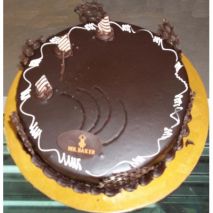 Send 2.2 Pounds Round Chocolate Cake by Mr. Baker to Dhaka in Bangladesh